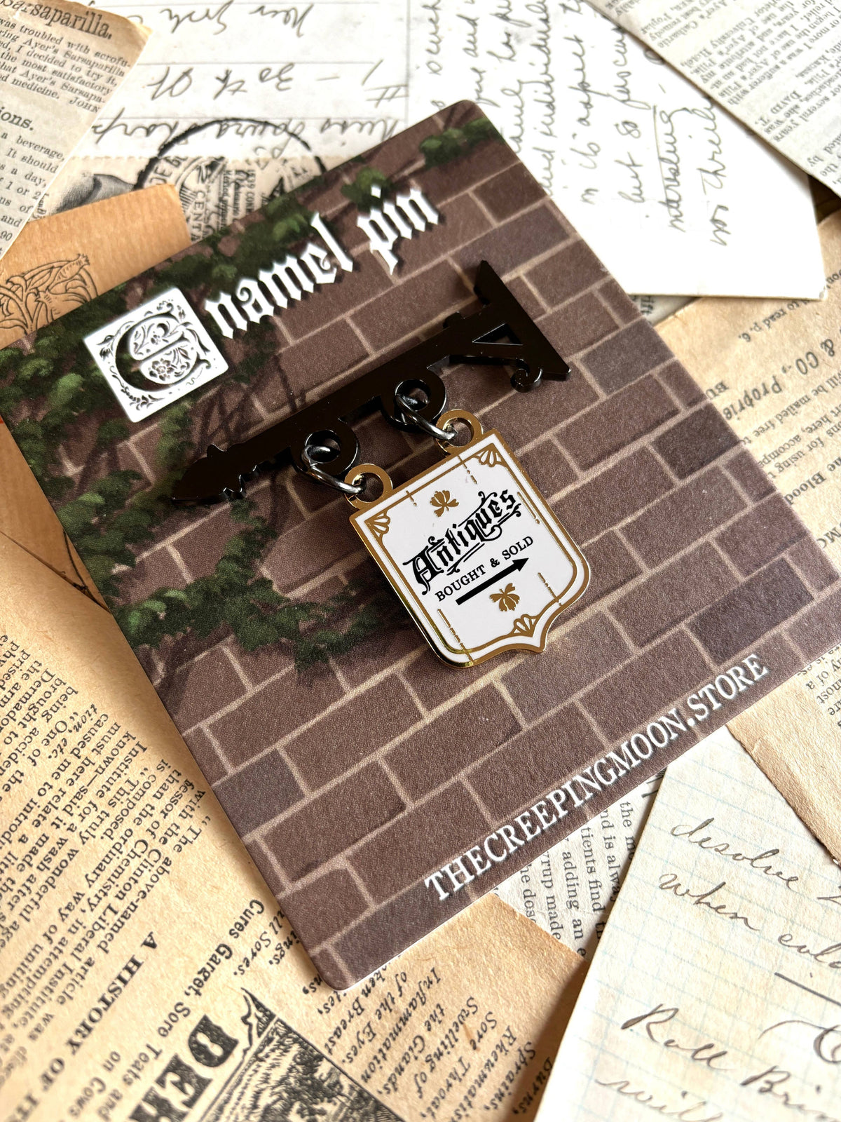 Antique shop sign enamel pin