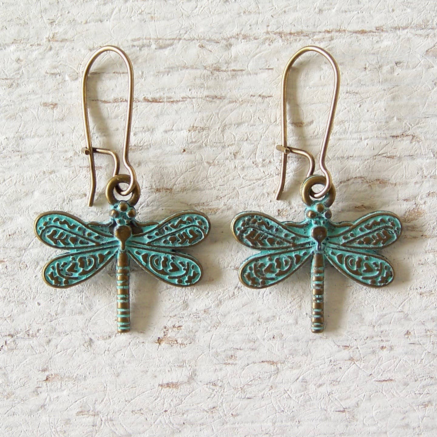 Nouveau Brass Charm Earrings: Dragonfly