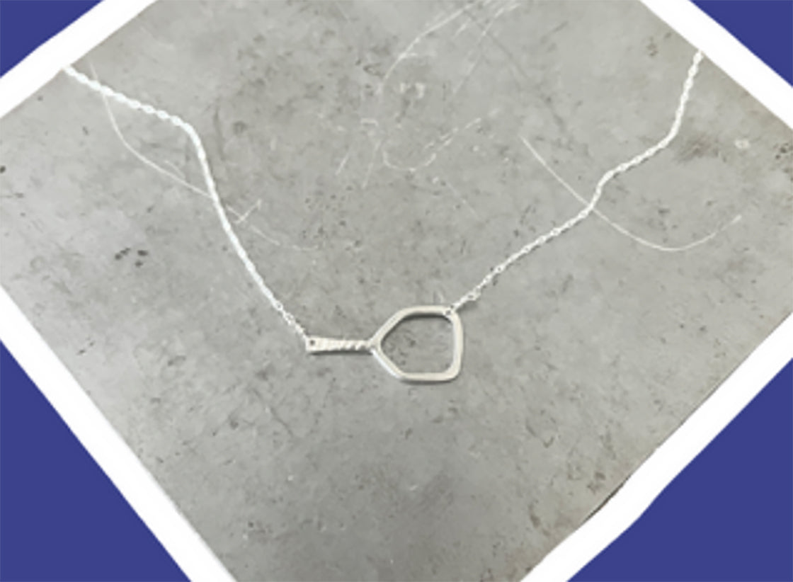 It's a Pickleball Paddle Necklace