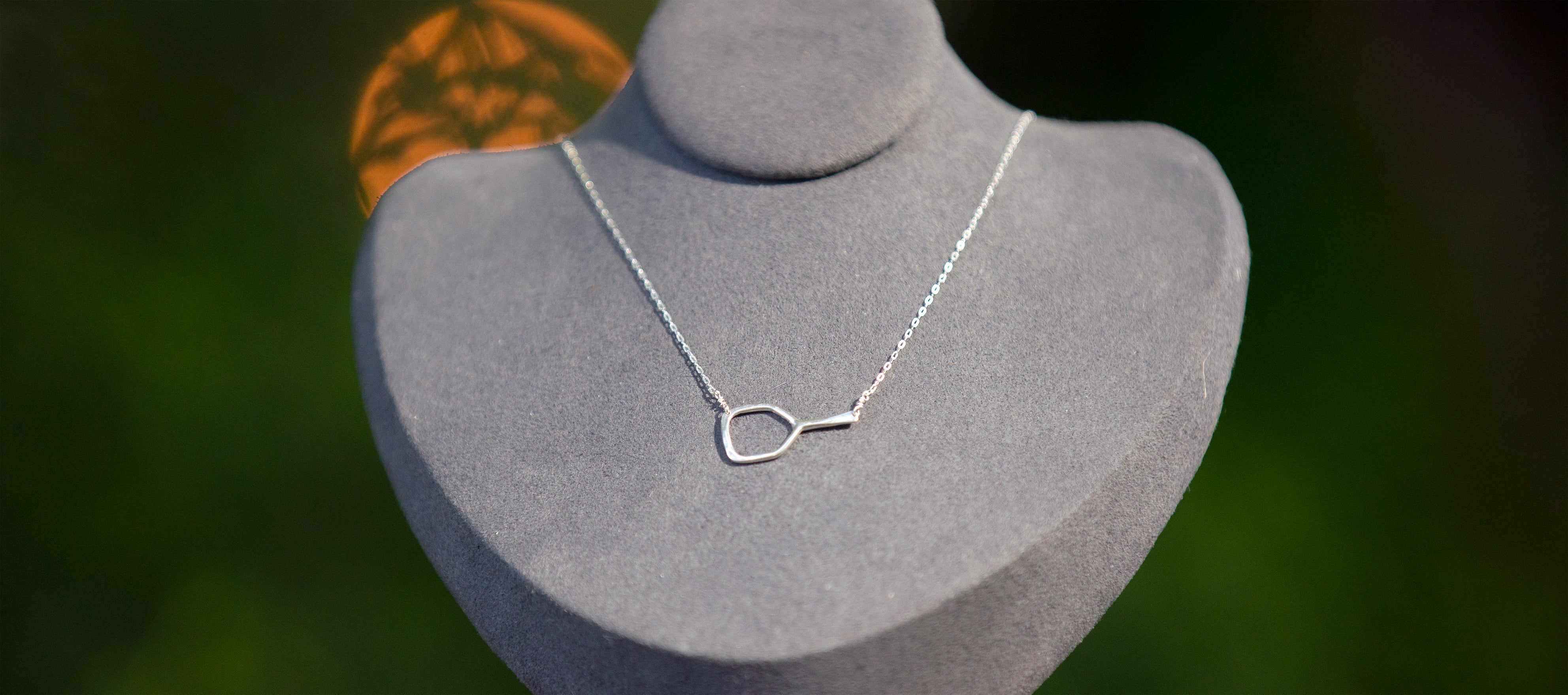 It's a Pickleball Paddle Necklace