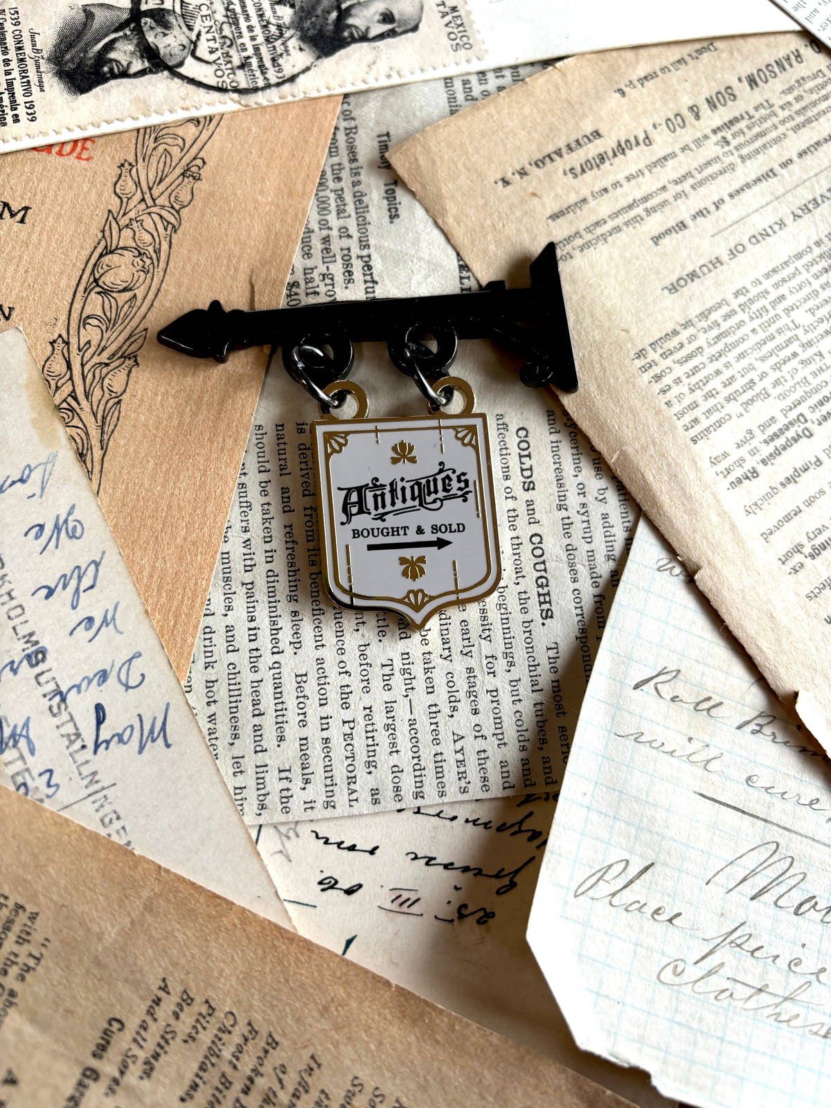 Antique shop sign enamel pin