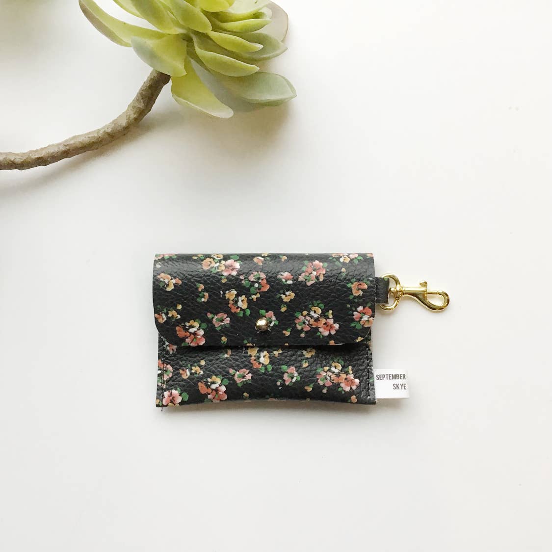 Leather card wallet in black floral