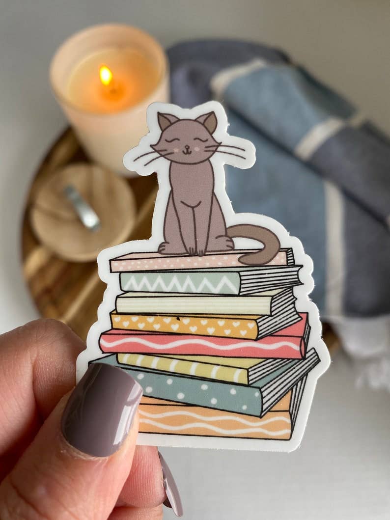 Cat on Books Sticker