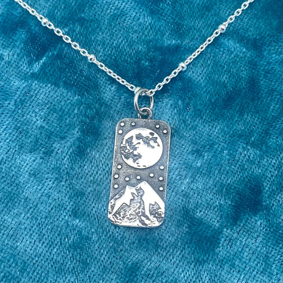 Silver full moon and mountain on rectangle charm necklace