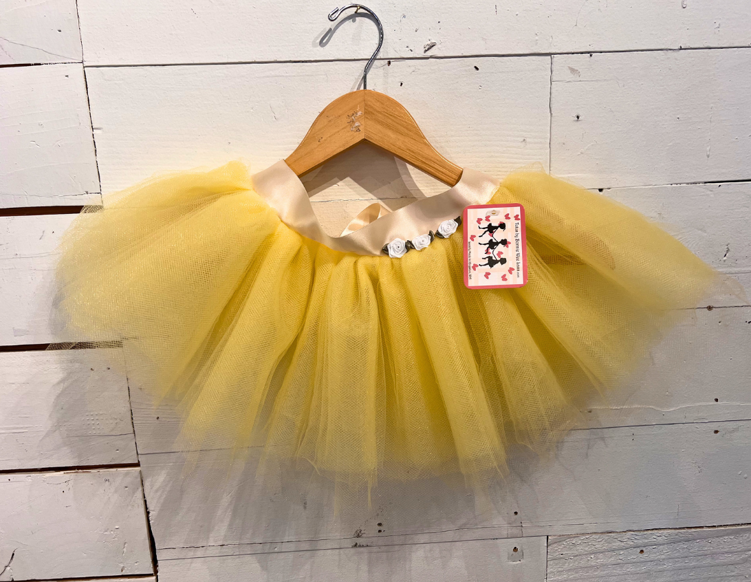 Yellow tutu with white roses