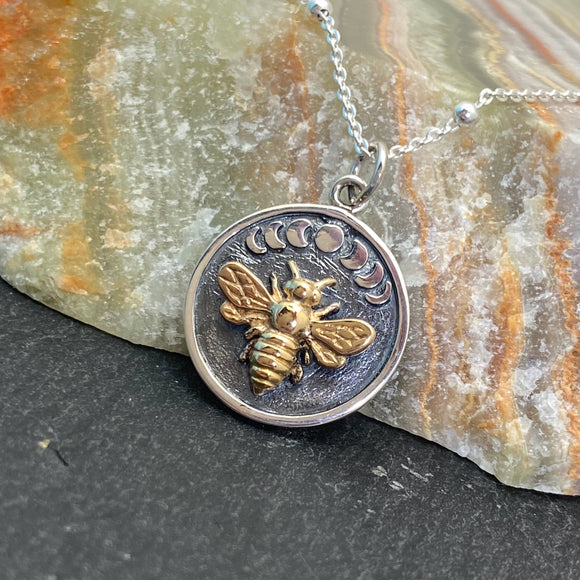Bronze Bee on Silver Disk With Moon Phases