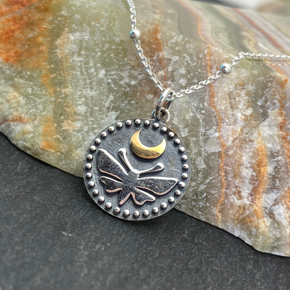 Silver Disk with Butterfly and Bronze Moon Necklace